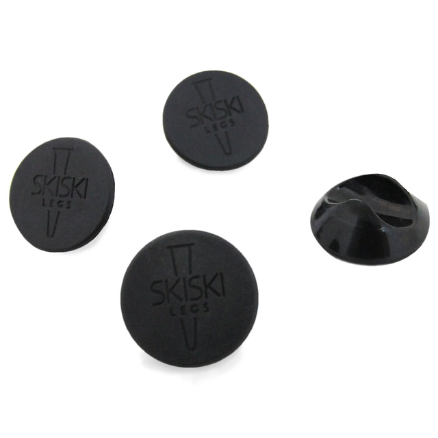 Black 12mm hairpin leg protectors with a smooth texture, featuring a logo, designed to prevent scratches on floors