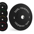 Black Olympic bumper plates featuring white lettering, available in various weights, with a textured surface for grip and durability