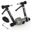 Velo Pro Fluid Turbo Trainer features a sturdy black frame, a silver fluid resistance unit, and adjustable legs for stability during indoor cycling