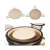Ceramic pizza stone with metal handles, designed for Kamado BBQ ovens, showcasing a smooth, light beige surface and sturdy construction