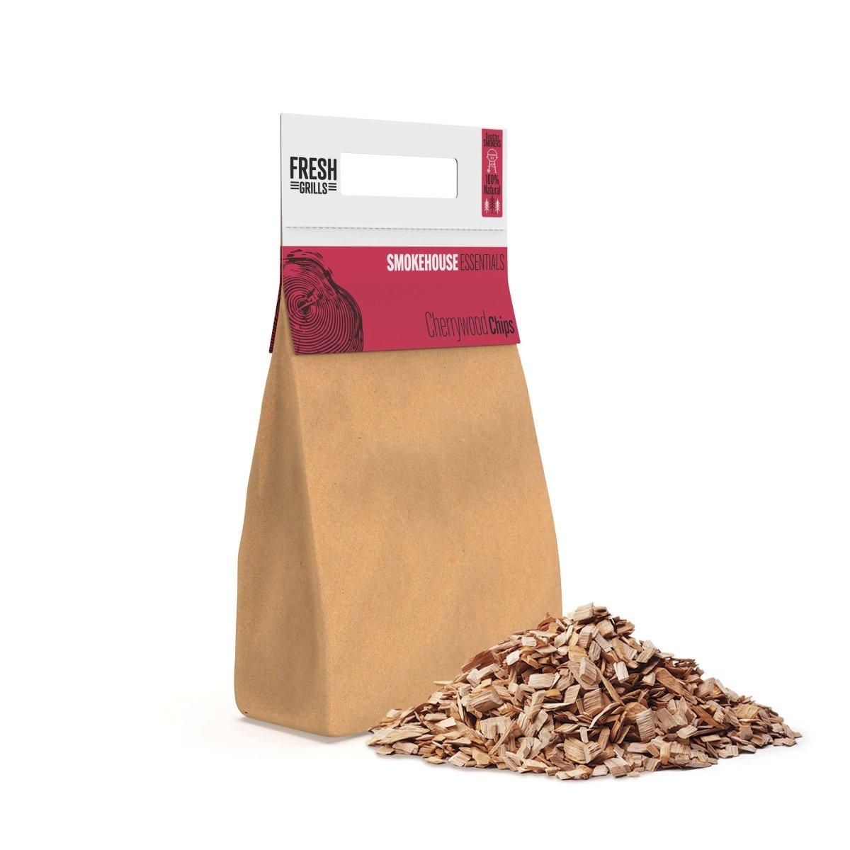 Brown paper bag filled with cherrywood chips, ideal for BBQ grills and smokers, showcasing a textured surface and vibrant wood color