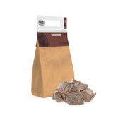 Hickory wood chunks in a brown paper bag, ideal for BBQ grills and smokers, showcasing rich textures and natural colors