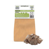 Chunks of applewood for BBQ grilling and smoking, featuring a natural brown color and rough texture, packaged in a recyclable bag