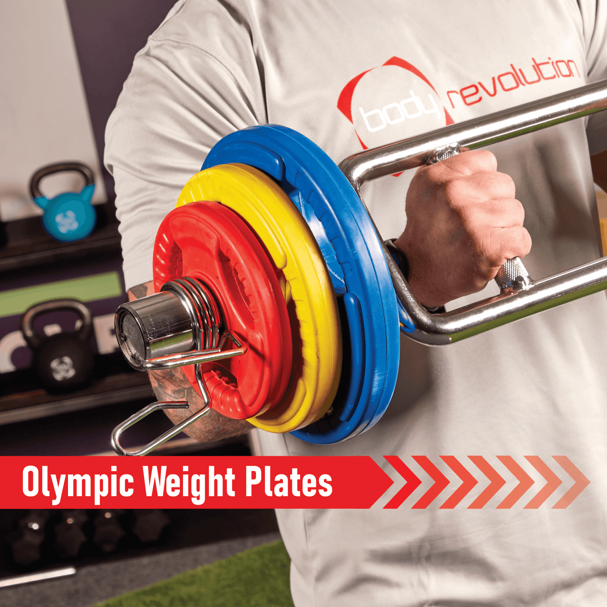 Brightly colored Olympic tri-grip rubber weight plates in blue, yellow, and red, securely attached to a barbell for weightlifting