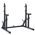 Heavy-duty black squat rack with adjustable height, sturdy steel construction, and rubber feet for stability during workouts