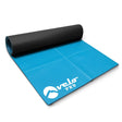 Non-slip turbo trainer mat featuring a textured black surface and a vibrant blue underside, ideal for stability during workouts